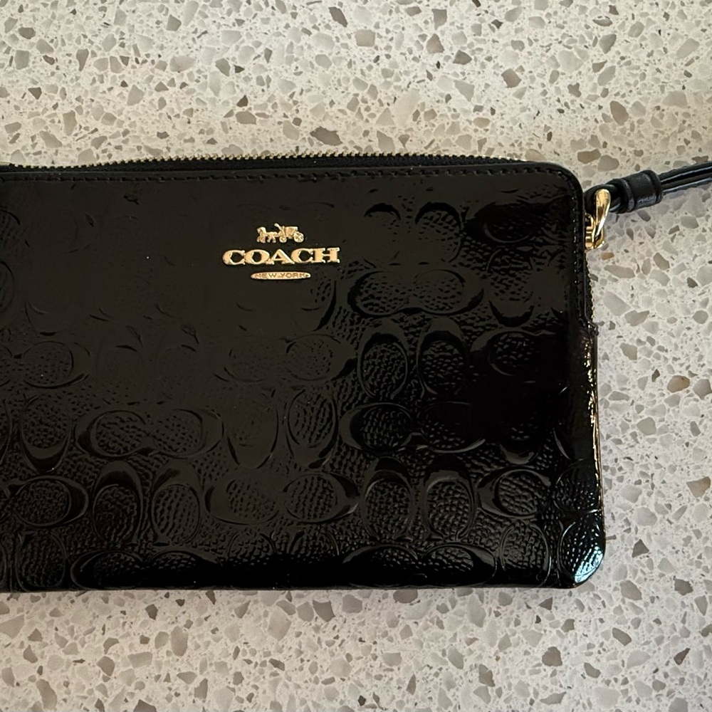 Coach Glossy Black Embossed Pouch